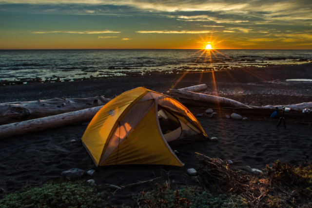 Tent in the seashore during sunset on Lost Coast Trail